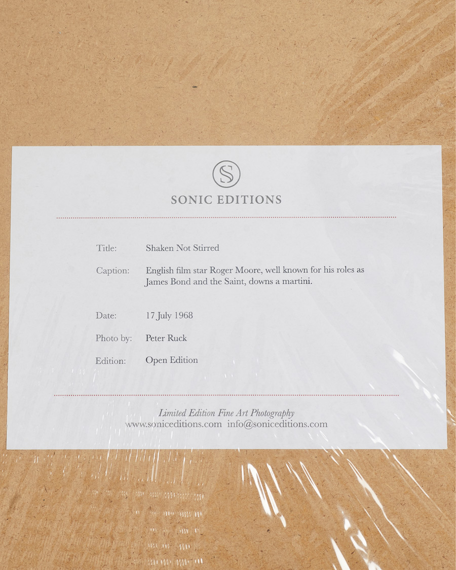 Herr | Sonic Editions | Sonic Editions | Framed Roger Moore Shaken Not Stirred 