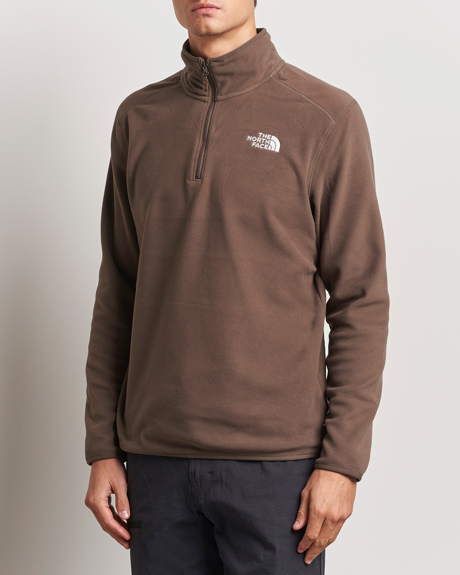 Herr |  | The North Face | 100 Glacier Fleece 1/4 Zip Dark Brown